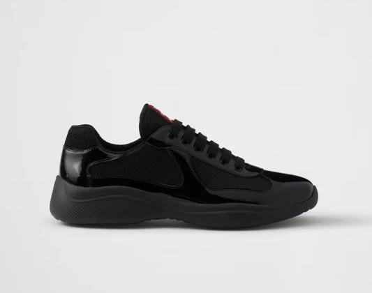 Sneakers Prada America’s Cup en cuir verni et tissu technique